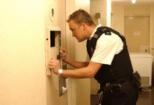 police look in cell warwickshire