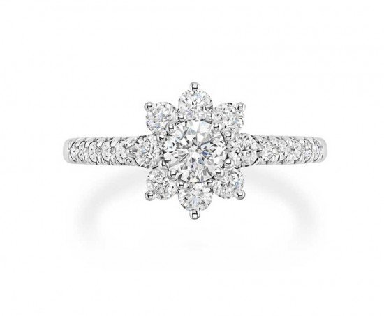 Оригинальное и прекрасное помолвочное кольцо с бриллиантом в виде подсолнуха от Harry Winston