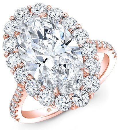 Какая оправа обручального кольца визуально увеличит бриллиант?